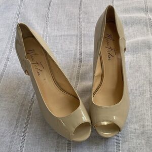 Marc Fisher nude peep toe platform heels.